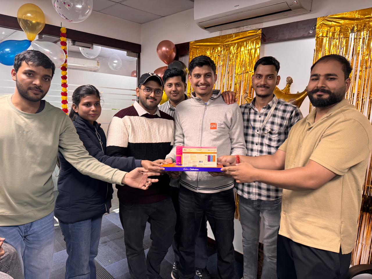 The Ecarter team celebrating a milestone together at the Noida office
